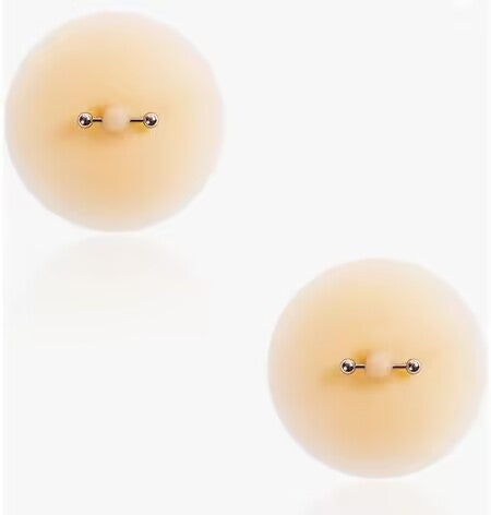 A pair of realistic body jewelry training patches holding classic silver metallic barbells for presentation.
