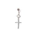 A silver-colored navel piercing ring with a brilliant round-cut main crystal and a dangling pave cross pendant, showcasing a classic and sleek look