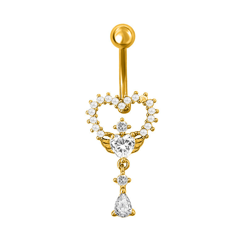 Front view of a gold heart-shaped belly button piercing with mini wings and a dangling pear-shaped drop
