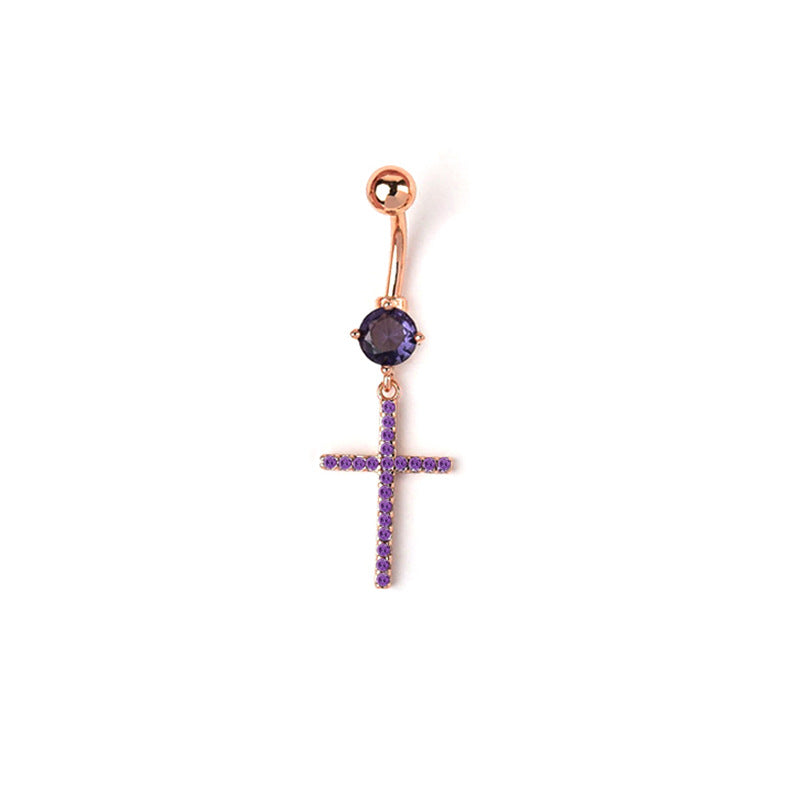 Rose gold tone curved barbell belly ring showcasing a deep purple solitaire crystal and a dangling cz cross
