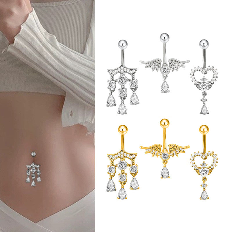 A lifestyle showcase of gold and silver dangle belly button rings featuring wings, heart, and chandelier designs, with a model wearing the silver chandelier style.